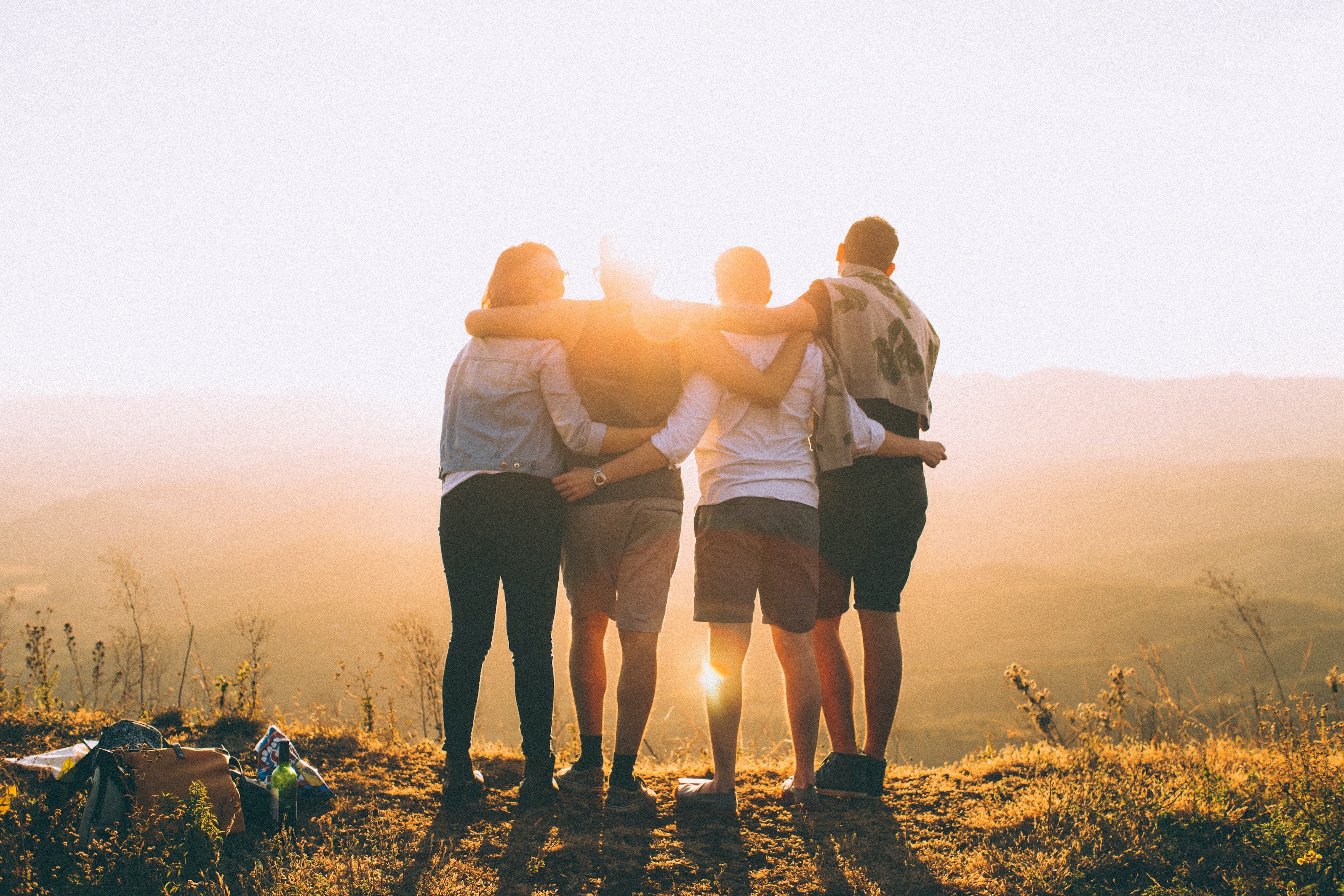 Group hug, since we're all friends now. Image via Unsplash.