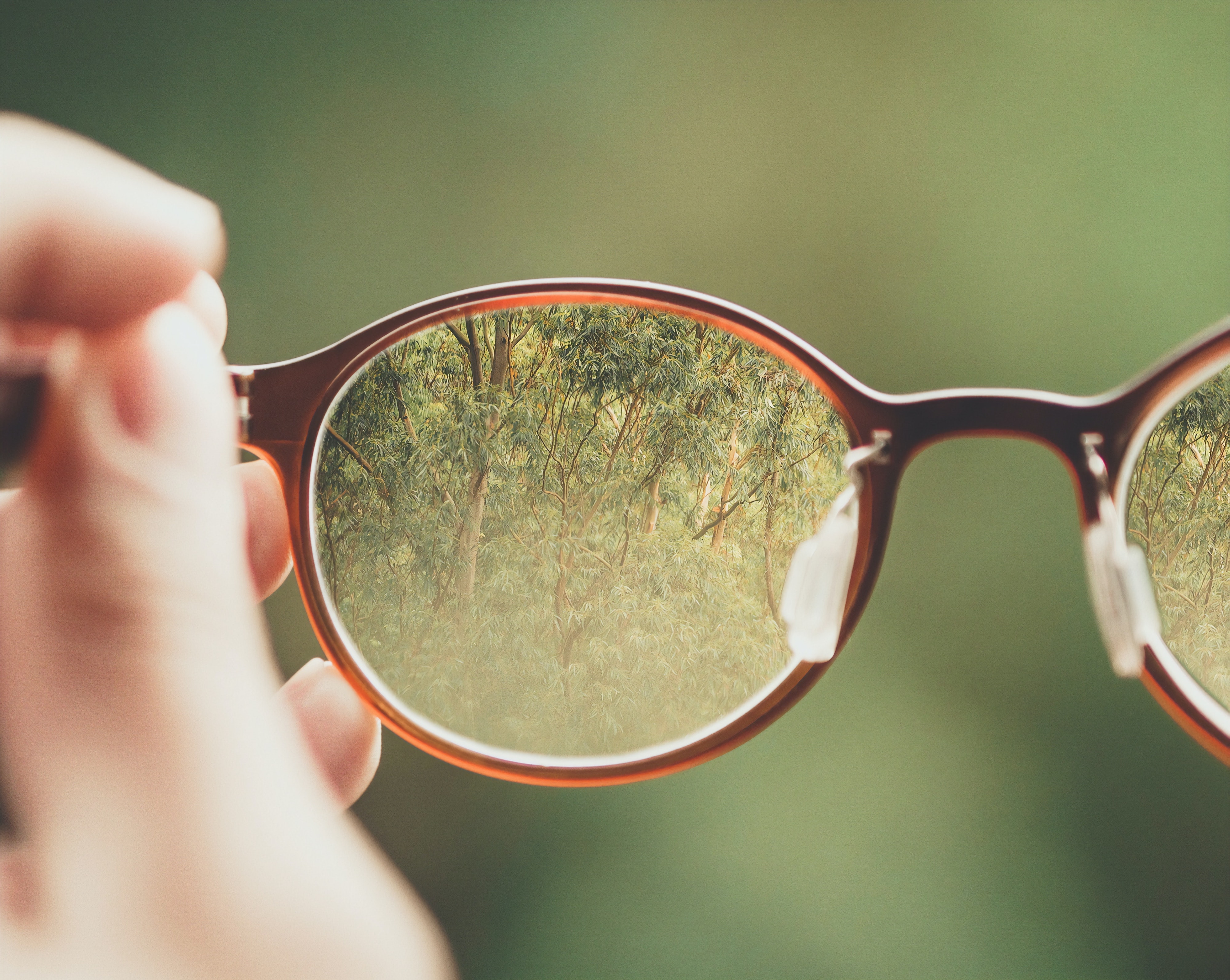 A pair of eyeglasses with lenses. Image via Unsplash.